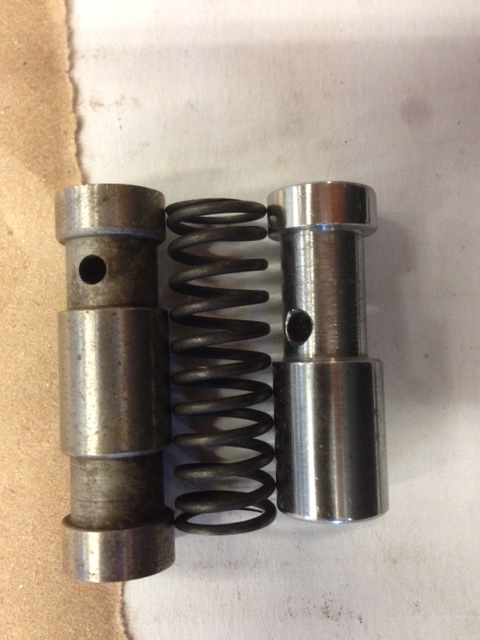The old spring and new spring were essentially identical. The new one was a &quot;green&quot; spring which is supposed to be the &quot;heavy&quot; one. The valve on the right is the standard valve.