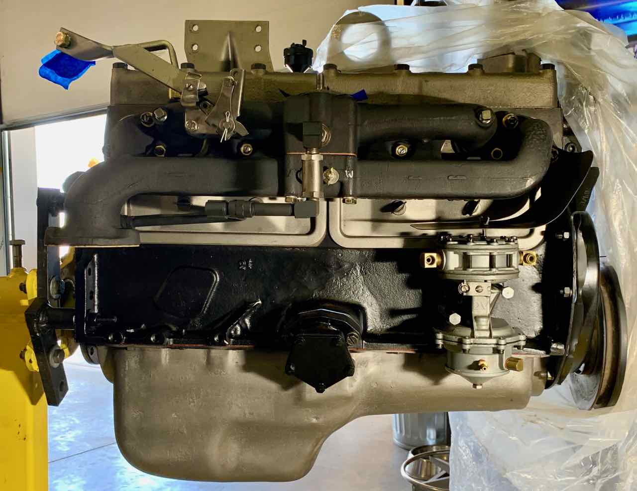 230 engine with PVC and manifolds bolted up (1).jpg
